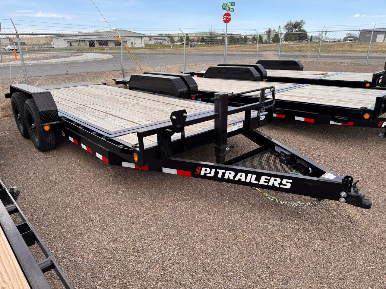 P.J. Trailers 2026 T6 83"X18' Equipment Tilt Trailer | Tandem Axle 14K, Torsion Axles, 2' Stat. + 16' Cushion Tilt