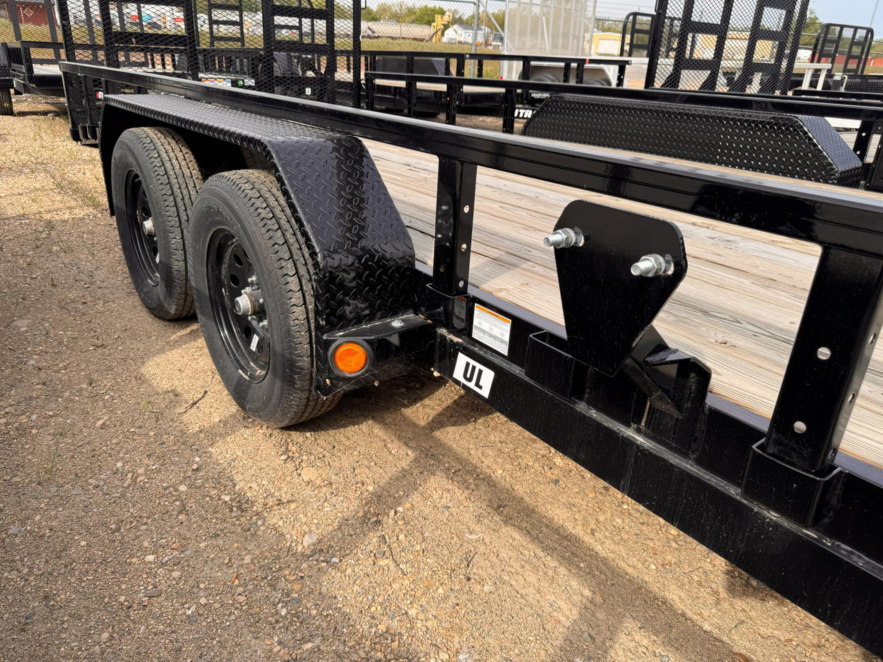 P.J. Trailers 2025 UL 83"X22' Utility Trailer | Tandem Axle 7K, HD Rampgate, Diamond Plate Fenders, Square Tube Rails, 12" OC Crossmembers, Dovetail
