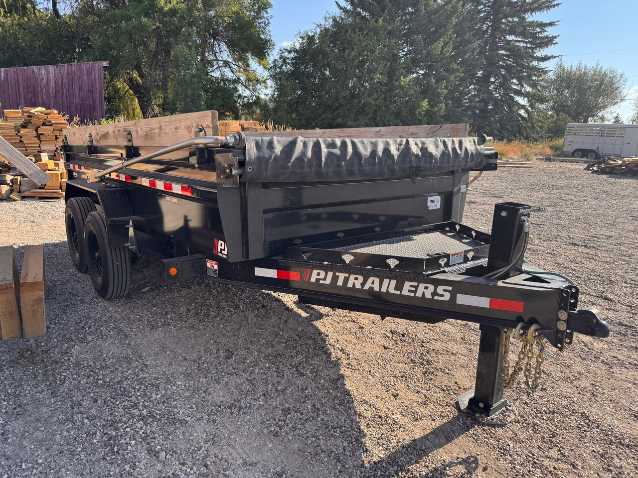 P.J. Trailers 2025 83"X14' Dump Trailer | Tandem Axle 14K, Tarp Kit, XL Tongue Storage Box, Hydraulic Jack, Slide In Ramps, Rear Support Stands, 2 Way Spreader Gate