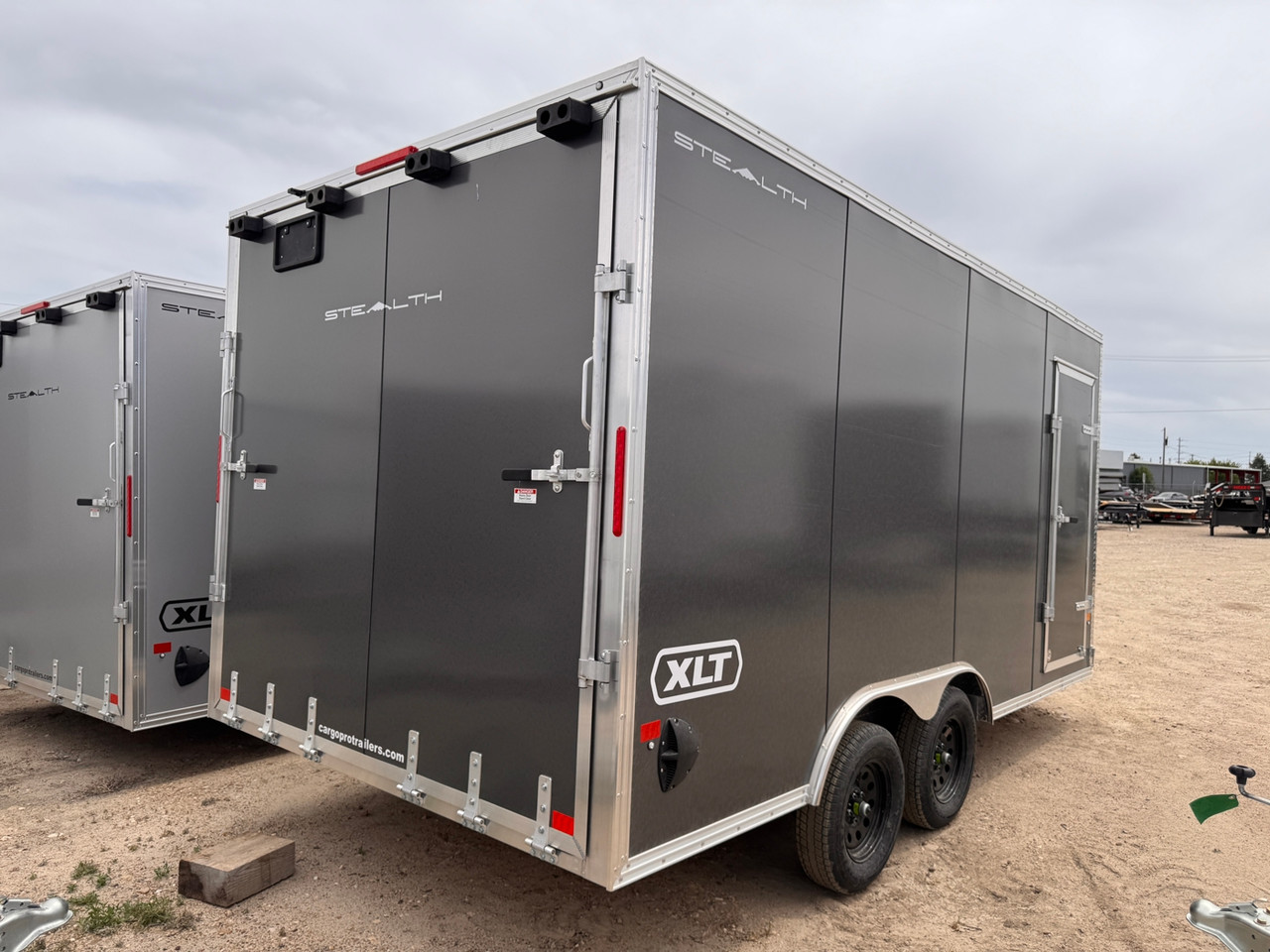 Alcom Trailers 2026 STEALTH 102"X16' Car Hauler XLT Pro Series Trailer | Tandem Axle 7K, Polycore Siding