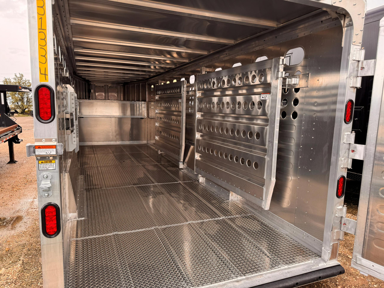 Merritt Trailers 2027 84"X24' Stock Trailer | Tandem Axle 15K, 2 Gates All Aluminum Body, Combo Swing Gate With Slider, Escape Door