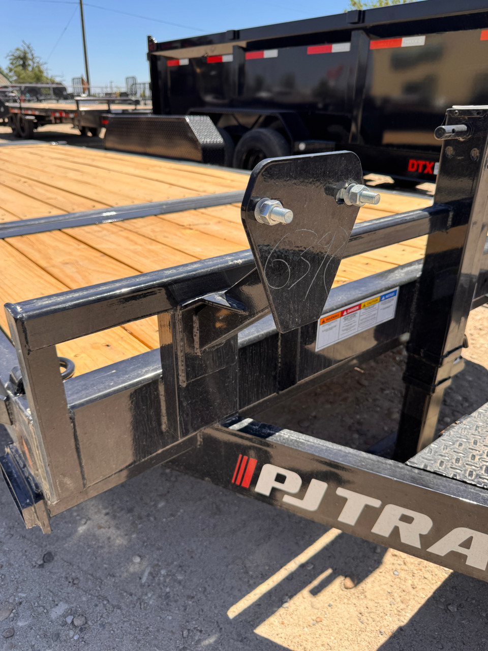 P.J. Trailers 2027 T6 20' Equipment Tilt Trailer | Tandem Axle 14K, Lid Over Tongue, Fork Holders