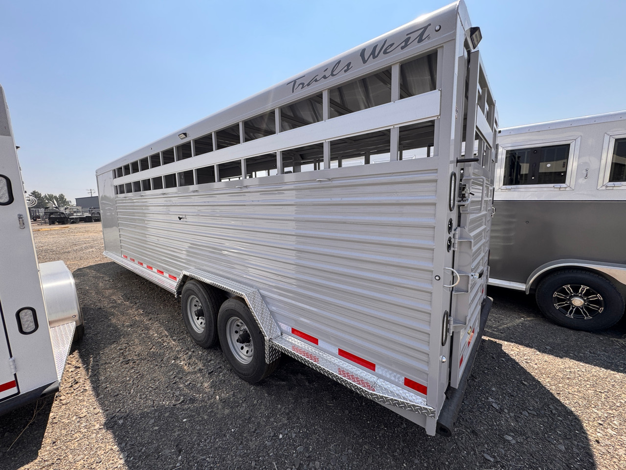 Trails West Trailers 2027 HOTSHOT 90"X25' Stock Combo Trailer | Tandem Axle 18.667K, Straight Tack Package, Single Tack Door, Rear Slider, Conv Package Spare