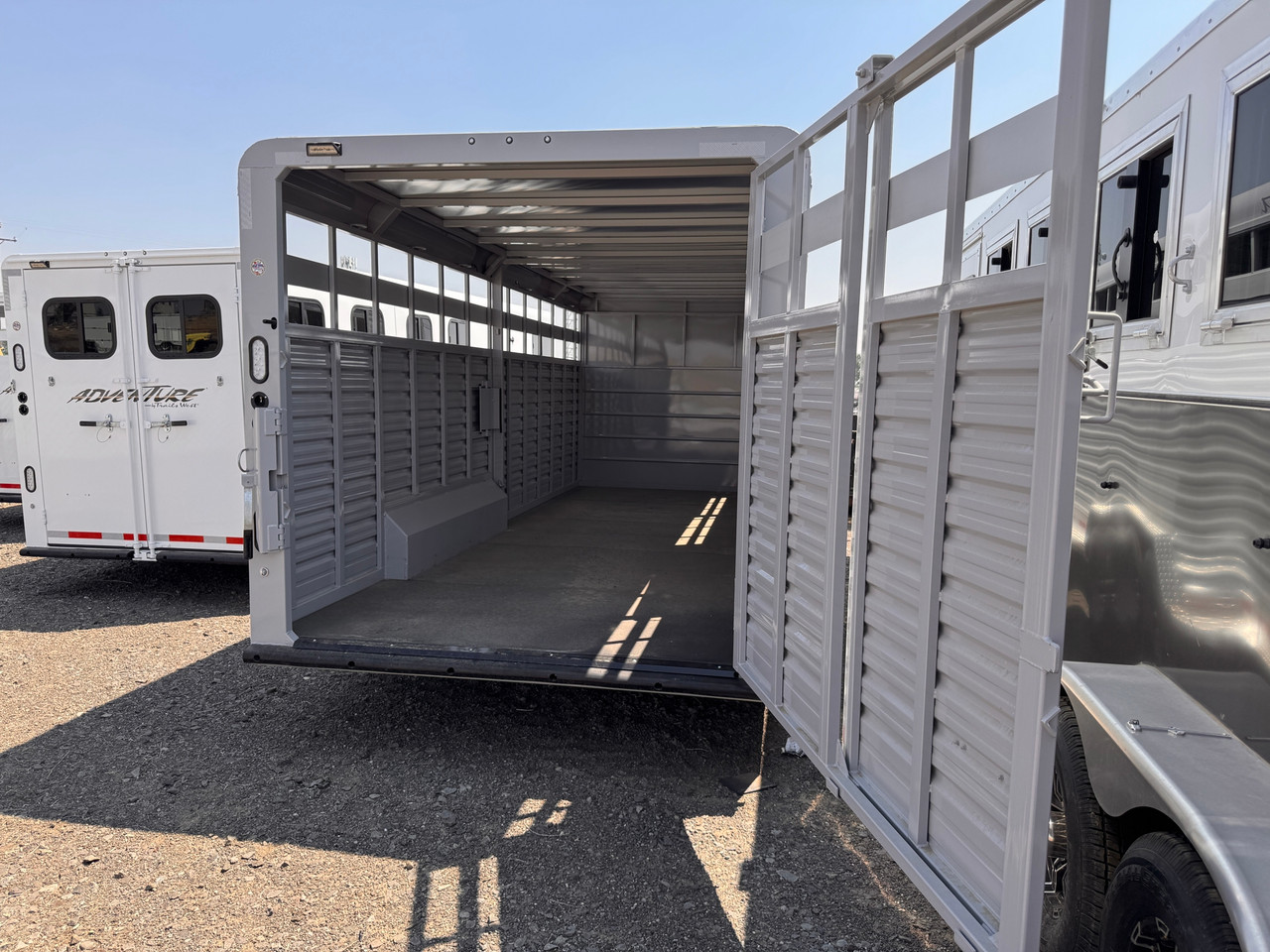 Trails West Trailers 2027 HOTSHOT 90"X25' Stock Combo Trailer | Tandem Axle 18.667K, Straight Tack Package, Single Tack Door, Rear Slider, Conv Package Spare