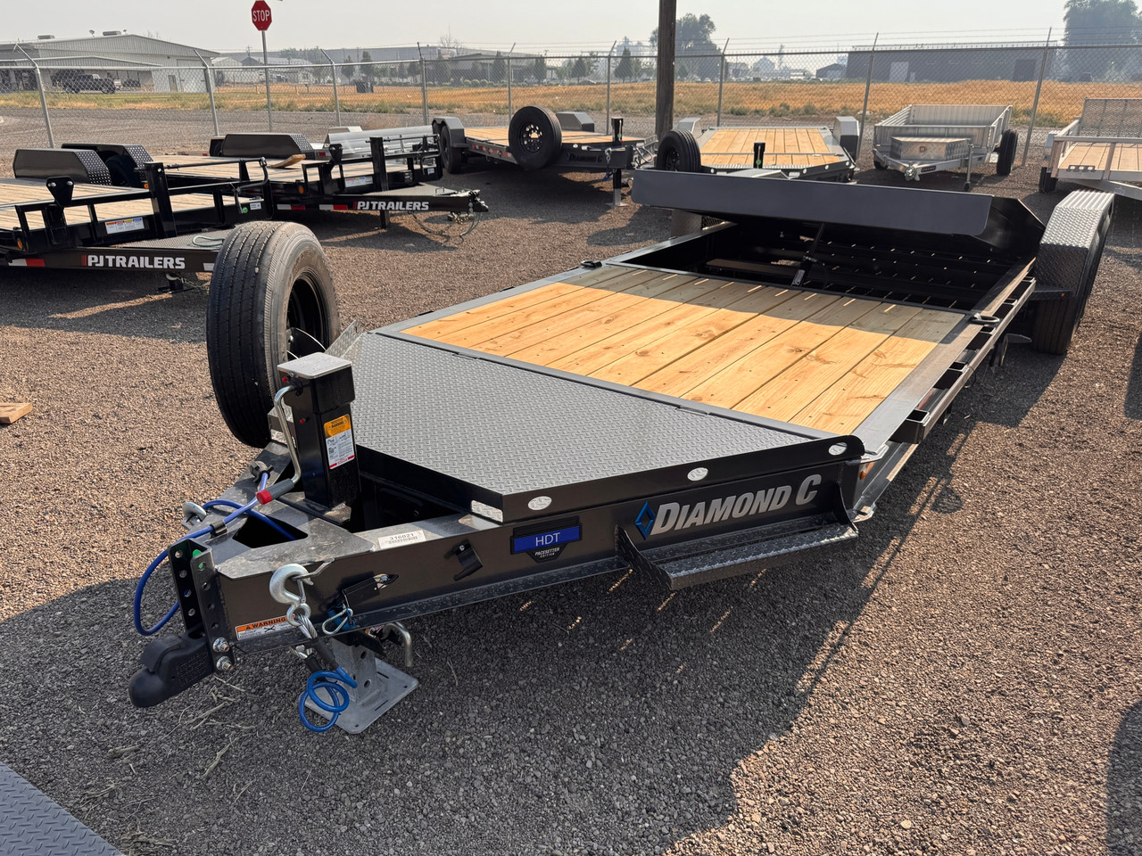 Diamond C Trailers 2026 HDT207 82"X22' Pacesetter Tilt Trailer | Tandem Axle 15.5K, Diamond Plate Fender, 12" OC Crossmembers, Fork Holder, Spare Tire