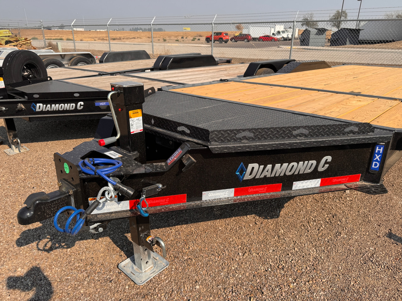 Diamond C Trailers 2026 HXD208 102"X22' Tilt Trailer | Tandem Axle 18K, Drive Over Fenders, XL Locking Tongue Box, 4' Stationary Deck,  2 Speed Jack, Spare Tire Mount