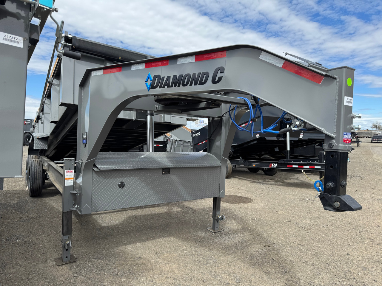 Diamond C Trailers LPT210 82"X16' Telescopic Dump Trailer | Tandem Axle, Torsion axles, 32" SIdes w/ Board Brackets, 3/16" HD Fenders, Solar Recharging, Spare
