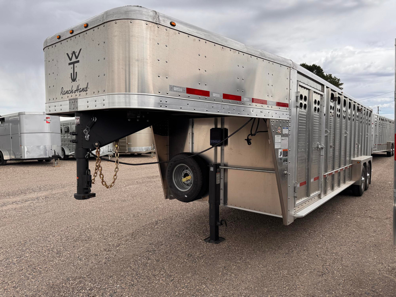 Wilson Trailers 2027 Punchside 84"X24' Stock Trailer | Alluminum, PSGN-5724, 16KGVWR, 7K AXLES, TIE RAIL INSIDE, 8 TIE LOOPS OUTSIDE, RUNNING BOARDS,