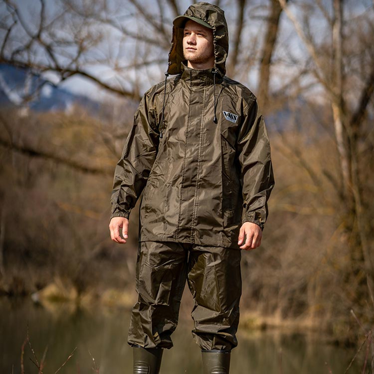 A fisherman wearing a set of Vass waterproofs