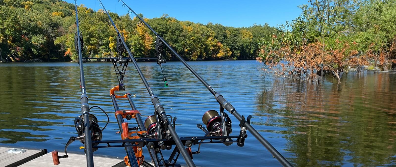 Fishing Adventures Carpfishing Fisherman And Carp Fishing Gear Angler With  Green Waders On Lake Stock Photo - Download Image Now - iStock