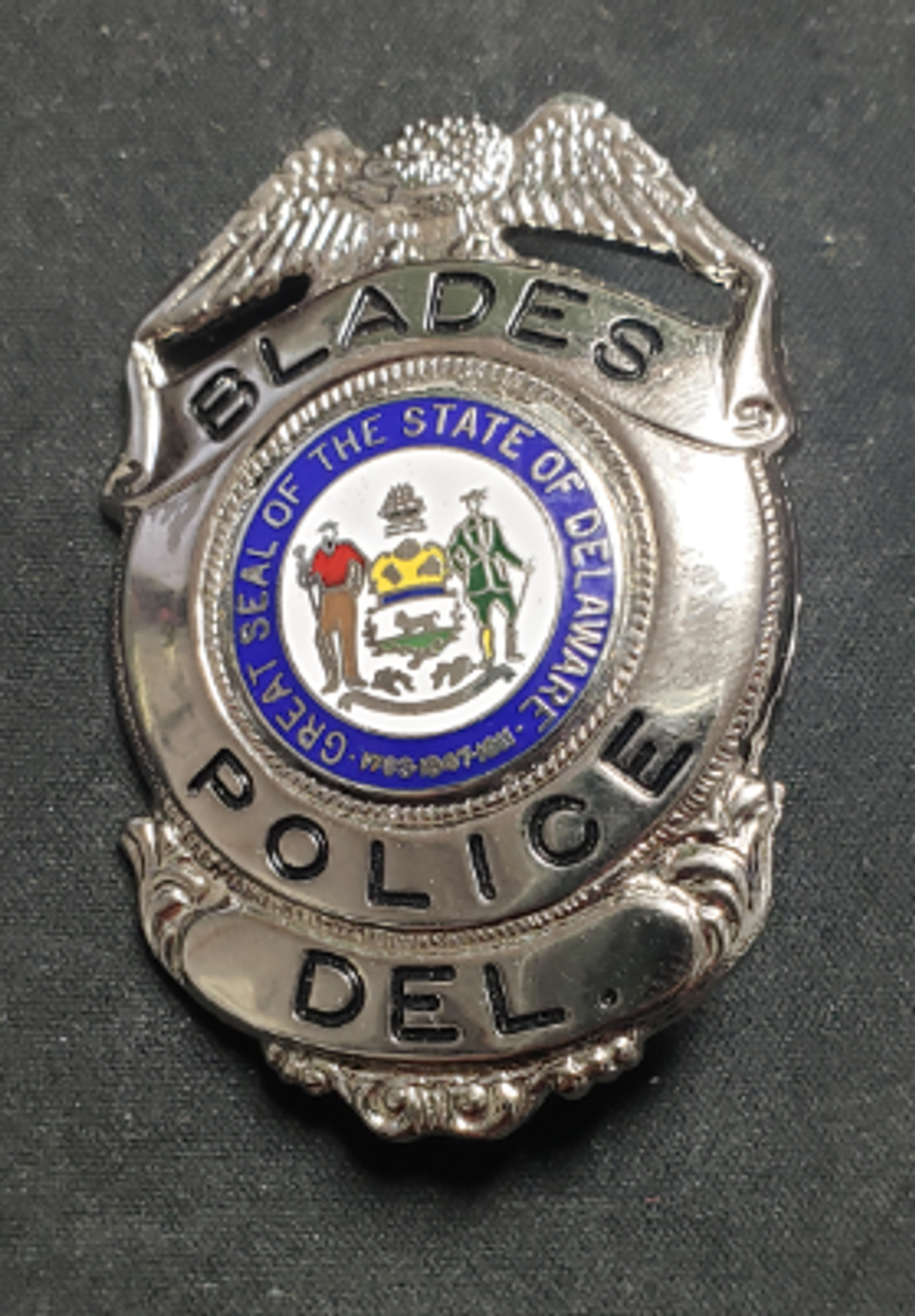 Blades DE Police Badge
