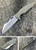 We Knife 701D D2 Wharncliffe Satin - Tan G10