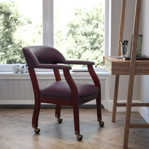 Burgundy LeatherSoft Conference Chair with Accent Nail Trim and Casters Burgundy LeatherSoft Conference Chair with Accent Nail Trim and Casters