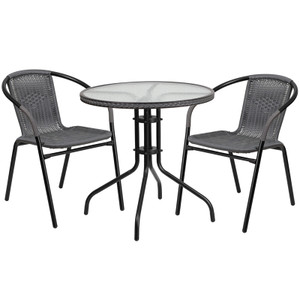 28'' Round Glass Metal Table with Gray Rattan Edging and 2 Gray Rattan Stack Chairs 28'' Round Glass Metal Table with Gray Rattan Edging and 2 Gray Rattan Stack Chairs