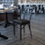 HERCULES Series Black Three-Slat Ladder Back Metal Restaurant Chair - Black Vinyl Seat HERCULES Series Black Three-Slat Ladder Back Metal Restaurant Chair - Black Vinyl Seat