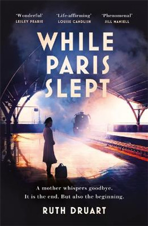 While Paris Slept: A mother in wartime Paris. A heartwrenching choice. A bestselling story of courage. by Ruth Druart