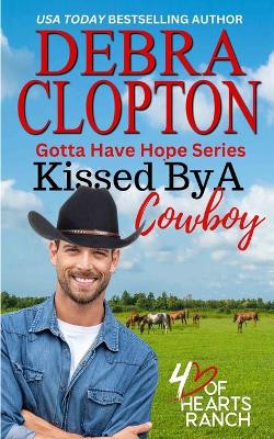 Kissed By a Cowboy by Debra Clopton 9781646257393