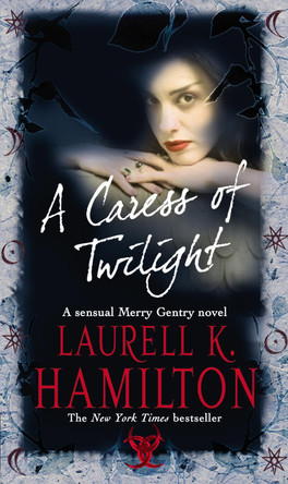 A Caress Of Twilight: Urban Fantasy (Merry Gentry 2) by Laurell K Hamilton 9780553813845 [USED COPY]