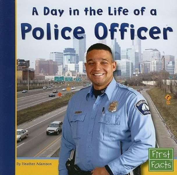 A Day in the Life of a Police Officer (Community Helpers at Work) by Heather Adamson