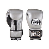 Cleto Reyes Hook and Loop Gloves
We guarantee anatomically designed gloves that will make adequate preparation of your hands before training. In addition, the wrist support will take you to a safe workout, preventing your hand from bending and damaging. The handmade leather strap with Hook and Loop closure provides a firm and faster glove fit. The Cleto Reyes Hook and Loop Gloves are ideal to give the best protection and comfort while training, sparring, and punching bag workouts.

The best boxing gloves brand you can ever choose.
Designed with the finest craftsmanship and highest quality material handmade in Mexico.
Manufactured gloves under a strict of the very best kind control in leather and all the materials.
The long-lasting latex foam padding gives your knuckles the support they need and a great effect on every punch.
The water-repellent linings prevent moisture from entering the padding and keep the glove weight constant.
Recommended for sparring, heavy bags, and training in general.
The attached thumb prevents eye injuries and keeps the thumb from being broken or sprained while training.
Weight suggested by professional trainers: 12oz until 129 lbs, 14oz for 130 to 159 lbs, 16oz and 18oz for 160 lbs. and up.
The weight marked on the label of this product is approximate, the weights may vary due to the nature of the manufacture of the product.