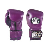 Cleto Reyes Hook and Loop Gloves
We guarantee anatomically designed gloves that will make adequate preparation of your hands before training. In addition, the wrist support will take you to a safe workout, preventing your hand from bending and damaging. The handmade leather strap with Hook and Loop closure provides a firm and faster glove fit. The Cleto Reyes Hook and Loop Gloves are ideal to give the best protection and comfort while training, sparring, and punching bag workouts.

The best boxing gloves brand you can ever choose.
Designed with the finest craftsmanship and highest quality material handmade in Mexico.
Manufactured gloves under a strict of the very best kind control in leather and all the materials.
The long-lasting latex foam padding gives your knuckles the support they need and a great effect on every punch.
The water-repellent linings prevent moisture from entering the padding and keep the glove weight constant.
Recommended for sparring, heavy bags, and training in general.
The attached thumb prevents eye injuries and keeps the thumb from being broken or sprained while training.
Weight suggested by professional trainers: 12oz until 129 lbs, 14oz for 130 to 159 lbs, 16oz and 18oz for 160 lbs. and up.
The weight marked on the label of this product is approximate, the weights may vary due to the nature of the manufacture of the product.