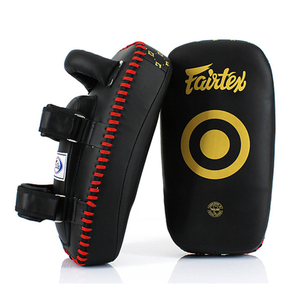 The Fairtex Lightweight Thai Kick Pads are easily maneuvered, allowing you to position them quickly and effectively. Two forearm straps help keep the pad firmly in place.
 
Made from Ocourless Microfibre material
Ergonomically angled design provides a secure and comfortable fit
Lightweight with soft pads
Comes with padded straps and forearm support
Extra Padding for Forearm Support