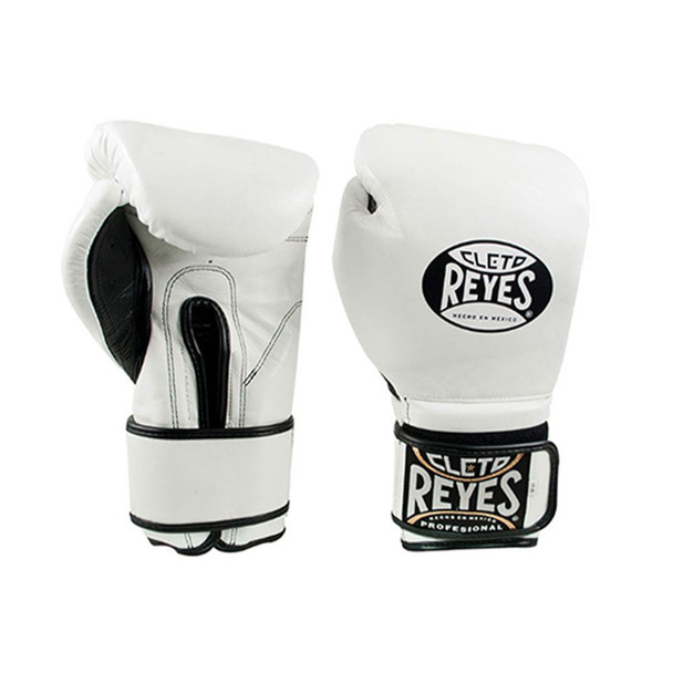 Cleto Reyes Hook and Loop Gloves
We guarantee anatomically designed gloves that will make adequate preparation of your hands before training. In addition, the wrist support will take you to a safe workout, preventing your hand from bending and damaging. The handmade leather strap with Hook and Loop closure provides a firm and faster glove fit. The Cleto Reyes Hook and Loop Gloves are ideal to give the best protection and comfort while training, sparring, and punching bag workouts.

The best boxing gloves brand you can ever choose.
Designed with the finest craftsmanship and highest quality material handmade in Mexico.
Manufactured gloves under a strict of the very best kind control in leather and all the materials.
The long-lasting latex foam padding gives your knuckles the support they need and a great effect on every punch.
The water-repellent linings prevent moisture from entering the padding and keep the glove weight constant.
Recommended for sparring, heavy bags, and training in general.
The attached thumb prevents eye injuries and keeps the thumb from being broken or sprained while training.
Weight suggested by professional trainers: 12oz until 129 lbs, 14oz for 130 to 159 lbs, 16oz and 18oz for 160 lbs. and up.
The weight marked on the label of this product is approximate, the weights may vary due to the nature of the manufacture of the product.