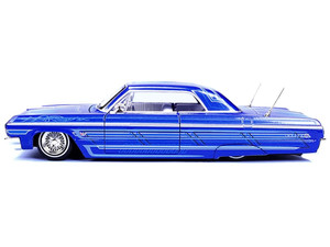 1964 Chevrolet Impala SS Lowrider Candy Blue with Graphics and White Interior "Lowriders" "Maisto D F977-32547BL