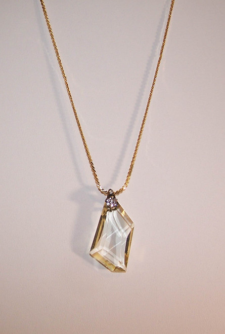 P-131 tan crystal pendant