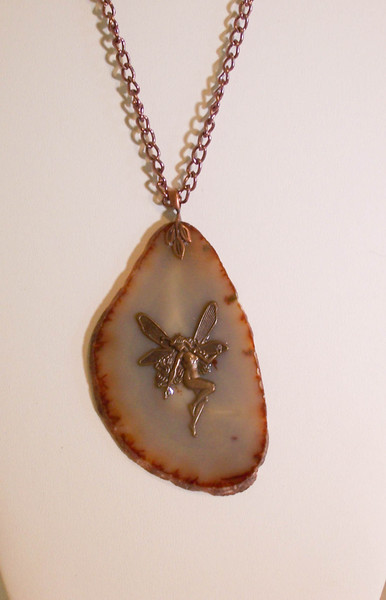 P-91 fairy on agate slab pendant