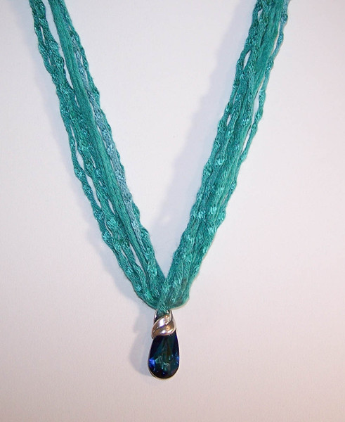 P-168 Deep blue crystal on yarn necklace