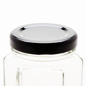 black canning lid on hexagon jar black canning lid on hexagon jar