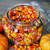 candy corn in pumpkin jar