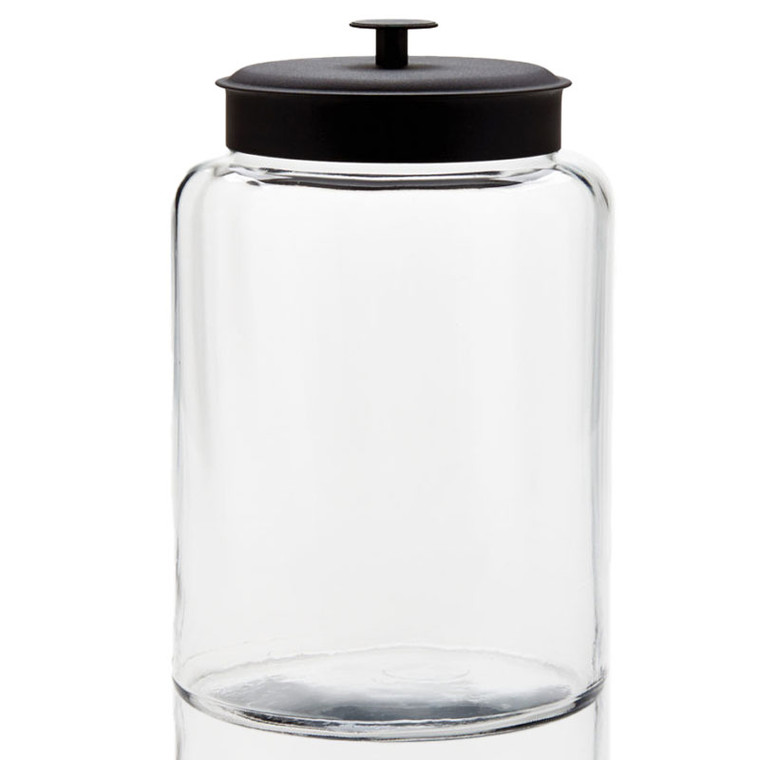 large glass storage with black lid