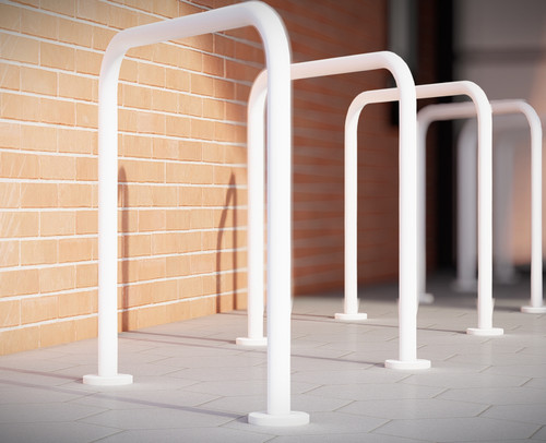 Sheffield cycle stand with base plates, powder-coated in white, featuring a durable tubular steel frame for secure bike parking.