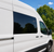 Ford Transit van window, Transit passenger sliding door window, Ford Transit fixed glass, Transit van privacy glass, Ford Transit OEM window, urethane bonded window, high-roof Transit window, medium-roof Transit window, van conversion window, aftermarket Transit window, tinted van window, DOT-approved van glass, work van window, camper van window, Ford Transit solid glass, van life window upgrade, solar privacy van glass, heat-reducing van window, factory fit van window.  TR201-F Installed