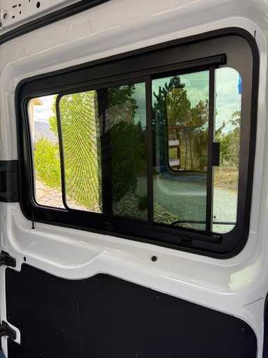 Ford Transit TR201 passenger sliding door cut line showing upper front triangular body protrusion