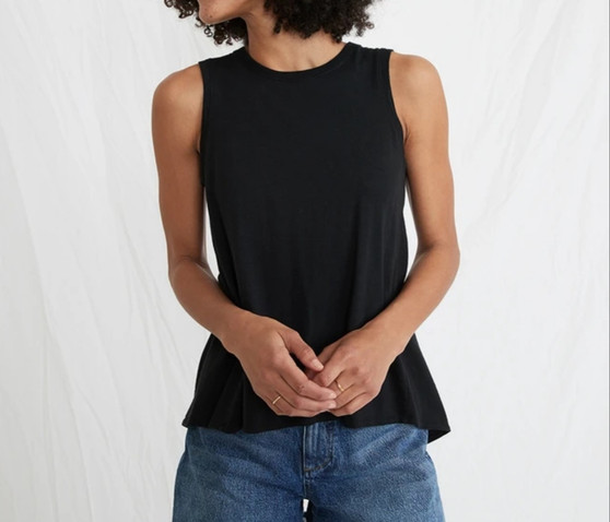 Tulip Tank have increased size armholes so you get a little more shoulder exposure (and won't look like you're wearing a muscle tee). Wear 'em alone, wear 'em under other stuff.