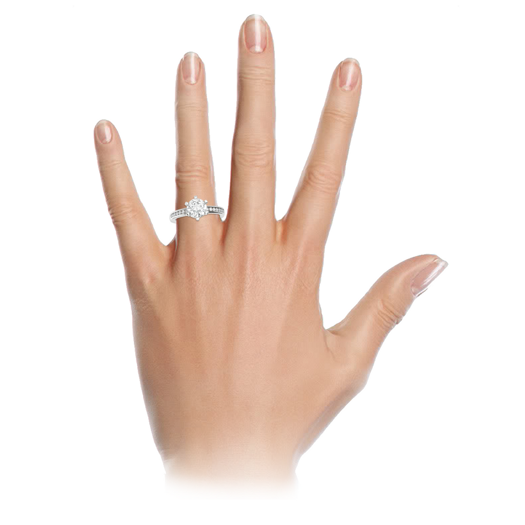 round-brilliant-1carat-diamond-6-claw-engagement-ring-channel-set-diamond-band-18-carat-white-gold-stylerocks-on-hand