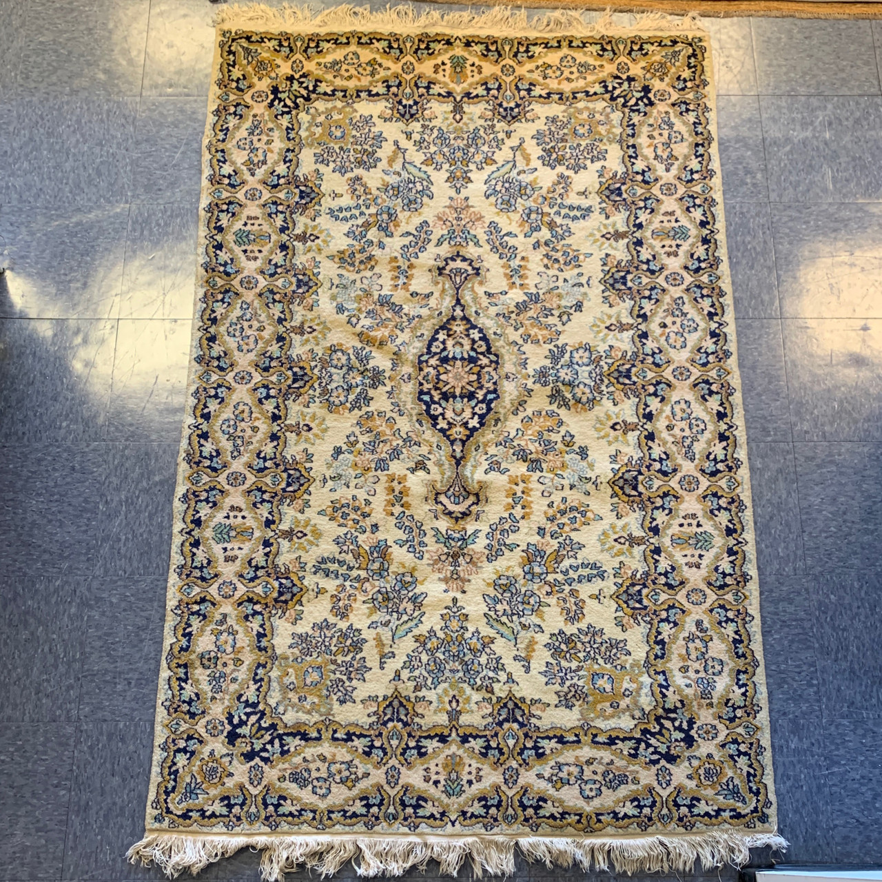 4’1” x 6’6” vintage cream, navy, and gold Persian kermon style ...