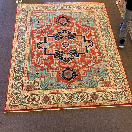 8x10 foot bright red, light blue and black traditional handknotted and serapi style carpet