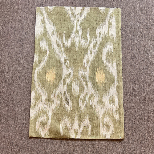 2‘0“ X 3‘0“ olive green, ivory and gold hand woven ikat style mat or carpet