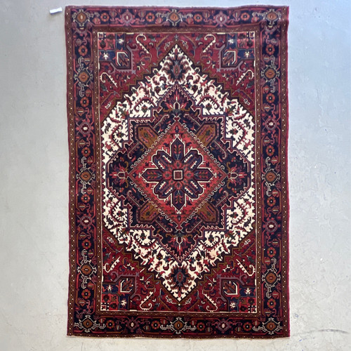 6‘6“ X 9‘9“ deep red and navy traditional Heriz pattern handknotted carpet