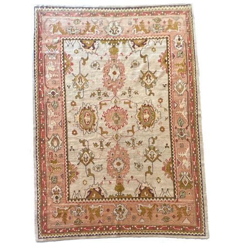 8’3” x 12’0” thick pile pink, beige and gold handknotted Tibetan carpet 