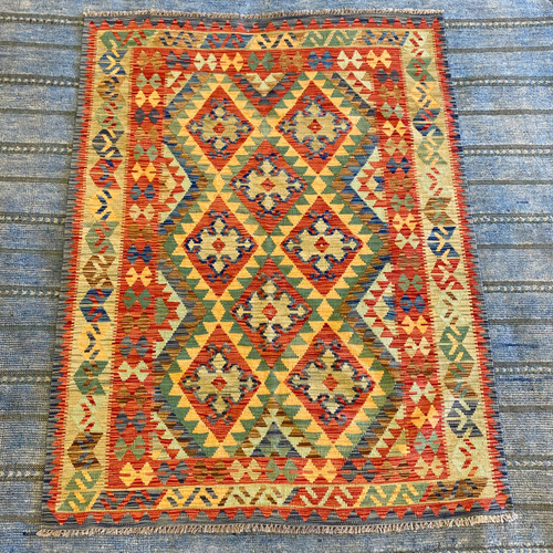 4’9 x 6’3 handwoven vegy dyed kilim in bright colors