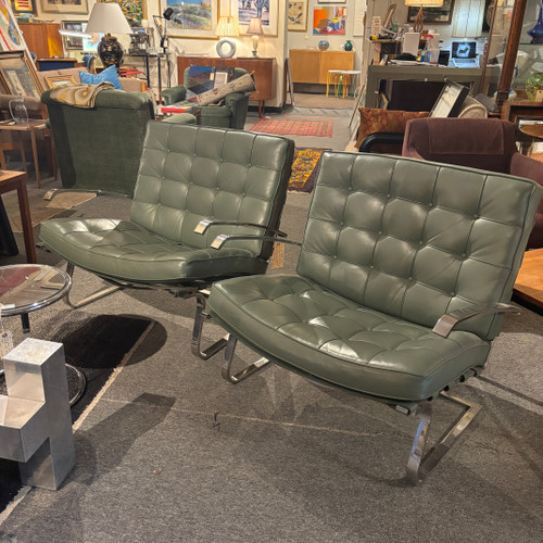 Pair of chrome and leather lounge chairs