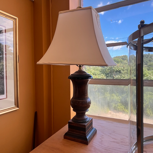 Vintage turned wood lamp in classic oil-burn form with silk pagoda shade.