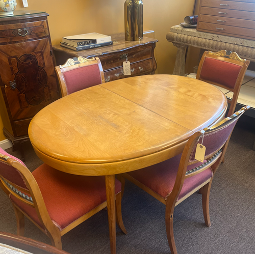 Heywood Wakefield — petite oval table with one leaf. Great scale for a tight space.
