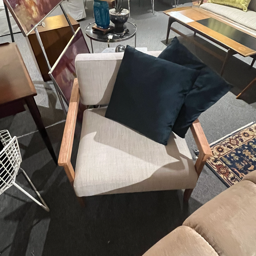 Contemporary cream upholstery teak armchair