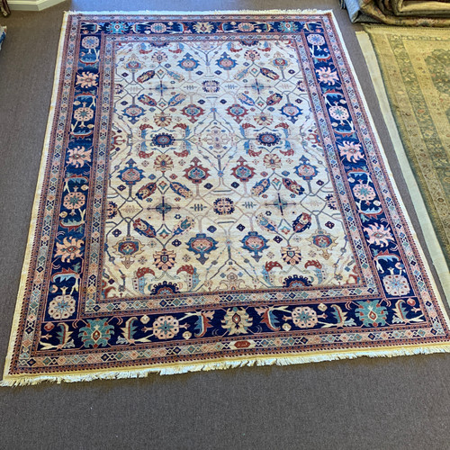 10’ x 14’ tribal traditional beige, navy blue and floral geometric handmade carpet